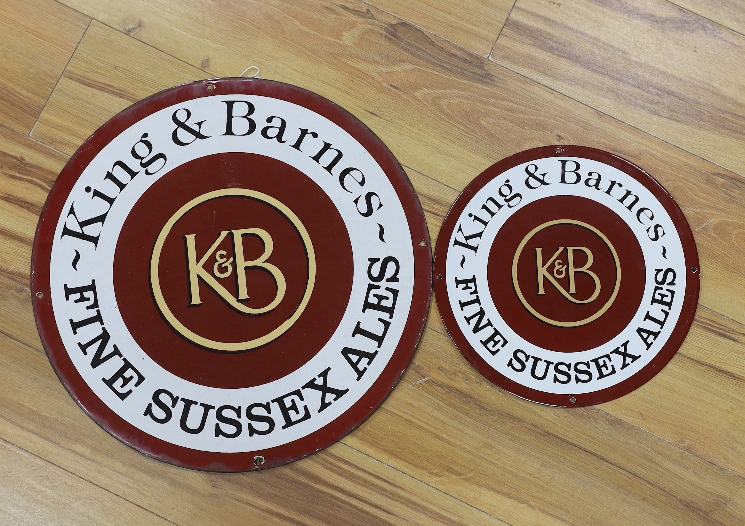 Two King & Barnes Fine Sussex Ale enamel signs together with a Friary Meux Bitter enamel sign, largest 45cm diameter